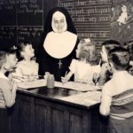Sister Claudia teaching children in class